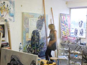 celina-teague-at-her-studio-working-on-her-painting