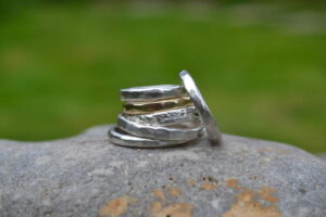 muriel-&-lily-via-artweb-handmade-wedding-rings-(silver-and-gold)-jewelry-photograph