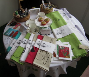 345633_display-of-work-for-sale--tea-towels-table-cloths-and-cards