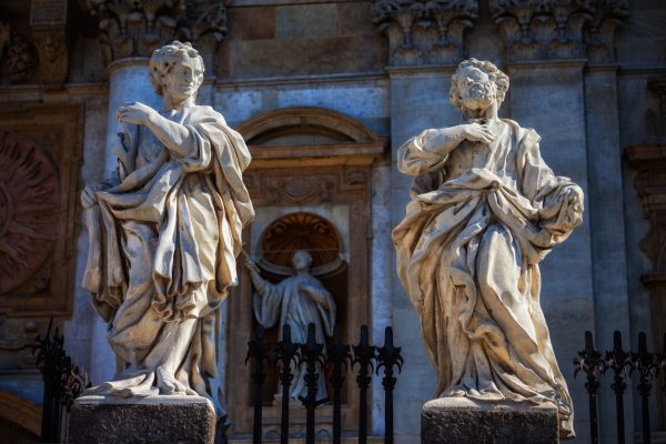 Statues-of-saints-at-Church-of-the-Apostles-St-Peter-and-Paul-in-city-of-Krakow-in-Poland-limestone-sculptures-designed-in-1722