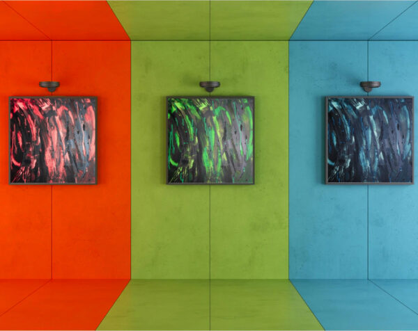 Red, green and blue room with matching abstract paintings