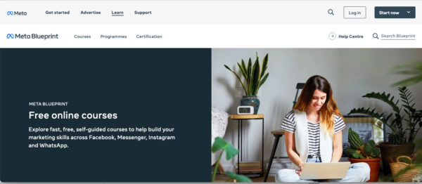 Meta Blueprint homepage featuring a woman on a computer.