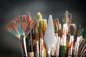 a collection of different shapes and sizes of paintbrushes