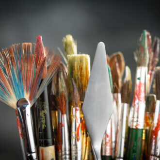 a collection of different shapes and sizes of paintbrushes