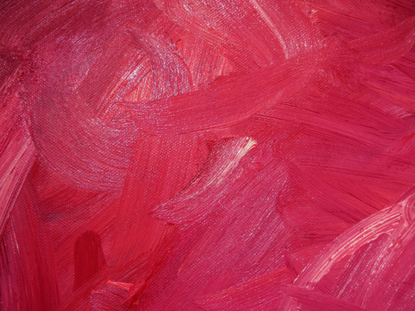 Acrylic paint brushstrokes in Viva Magenta, Panton's Color of the Year for 2023