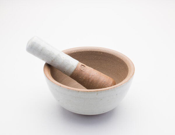 White and beige two-tone pestle and mortar